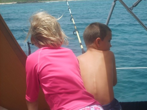 John and  Little Val checking the fishing pole... no fish